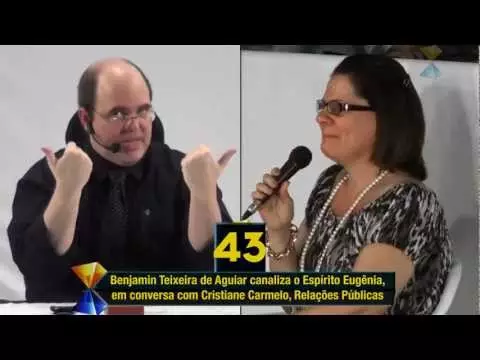 46 Informações Precisas (quase todas desconhecidas de qualquer pessoa viva na matéria), num Breve Vídeo-Sinopse da Interação da Relações Públicas Cristiane Carmelo com o Espírito Eugênia, por Intermédio do Médium Benjamin Teixeira de Aguiar, ao Vivo, Perante Centenas de Pessoas, na Palestra de 13 de Novembro – Aos Domingos, 6h da Tarde, Espaço Emes, Entrada Gratuita.